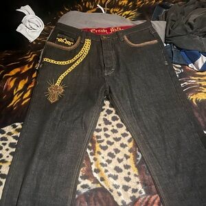 Crown holder pants , design on the back & front